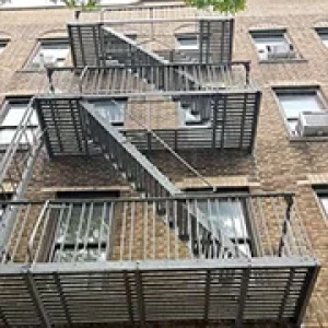 Fire Escape Repair Services for NYC Property Owners 6 Fire escape structural repair New York – multi-level fire escape system on apartment building