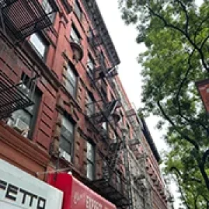 Fire Escape Repair Services for NYC Property Owners 5 Licensed fire escape repair service NYC on red brick residential building